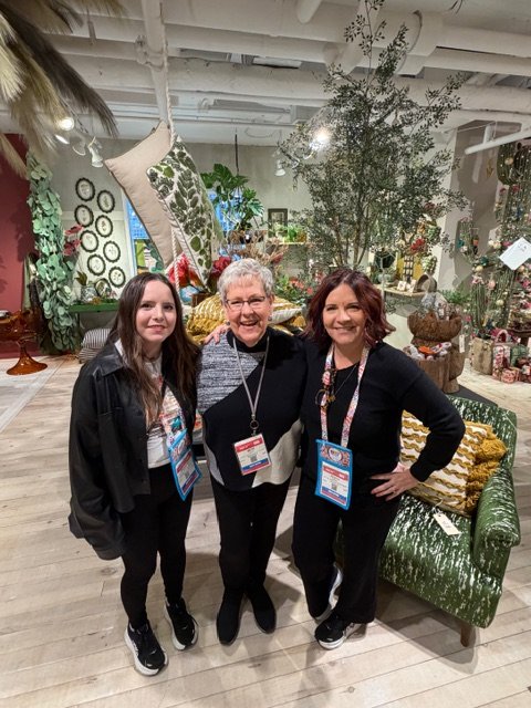 Krista, Beth, and Caroline at market — buying for The Little Wren Shop