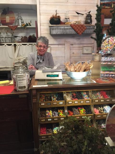 Ginny Paul behind the candy counter.
